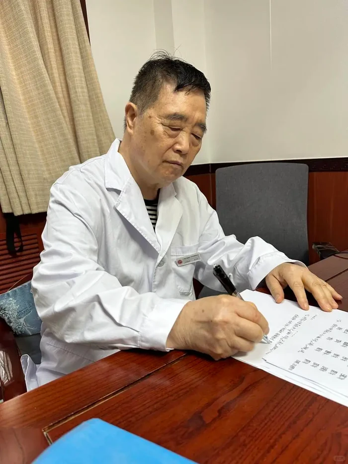 TCM practitioner preparing notes